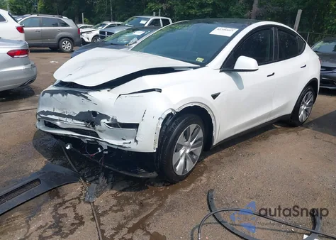 2023 Tesla Model Y from USA, damaged, VIN 7SAYGDEE1PF647564